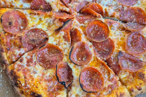 Too Cheezy's Pizza