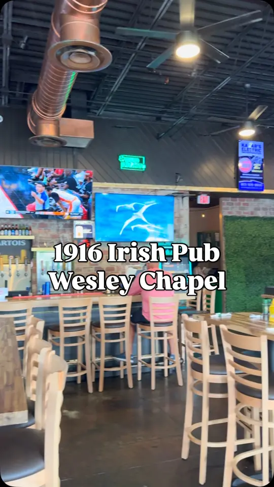 1916 Irish Pub Lakeland in Lakeland showing authentic irish pub vibes, grab a stool, order a pint, fish and chips, crispy golden fish and chips, full bar, hearty pub fare, video by Pasco County Rising on Facebook