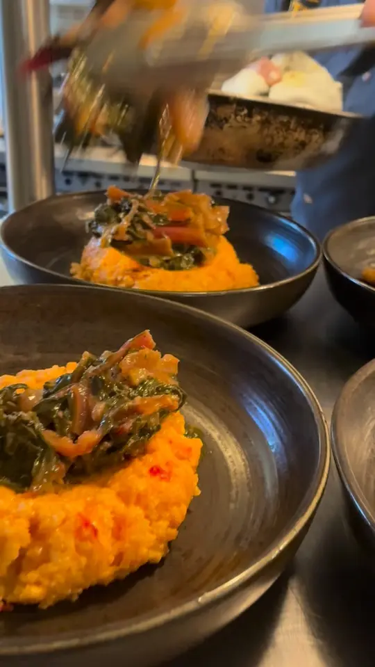 28 North Gastropub & Scratch Kitchen in Melbourne showing food, seared bone in pork chop, pimento grits, braised swiss chard, mushroom gravy, video by 28 North Gastropub on Facebook