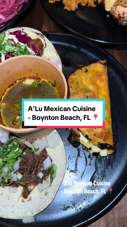A'lu Mexican Cuisine in Boynton Beach showing drink, frost bite drink, food, short rib empanadas, food, short rib taco, food, fish taco, food, chopped salad, food, stuffed chicken breast, video by de_lishus on TikTok