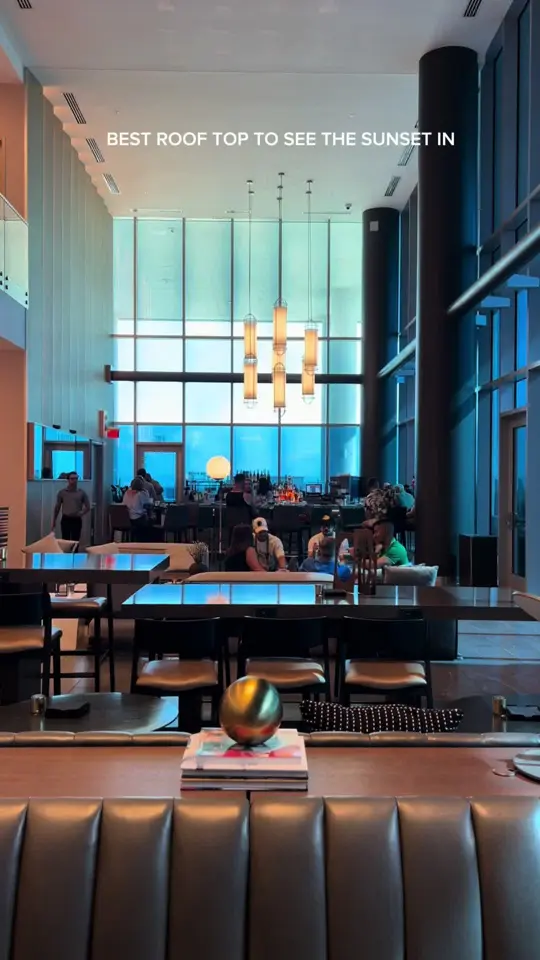 AC Sky Bar in Orlando showing rooftop bar, restaurant, cityscape view, sunset, tapas, cocktails, video by libardous on TikTok