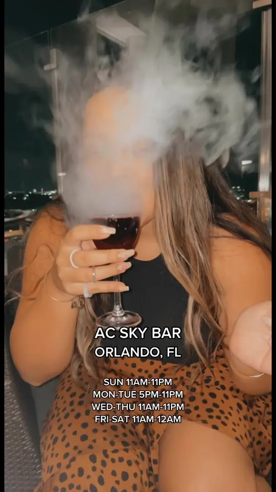 AC Sky Bar in Orlando showing cocktail, cosmopolitan; cocktail, spicy margarita, video by bite4bite on TikTok