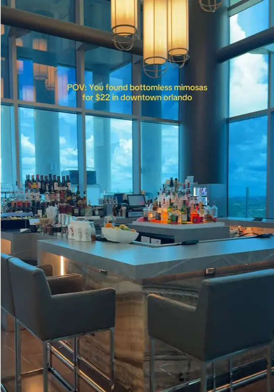 AC Sky Bar in Orlando showing brunch, bottomless mimosas, rooftop views, video by yxngcharles on TikTok