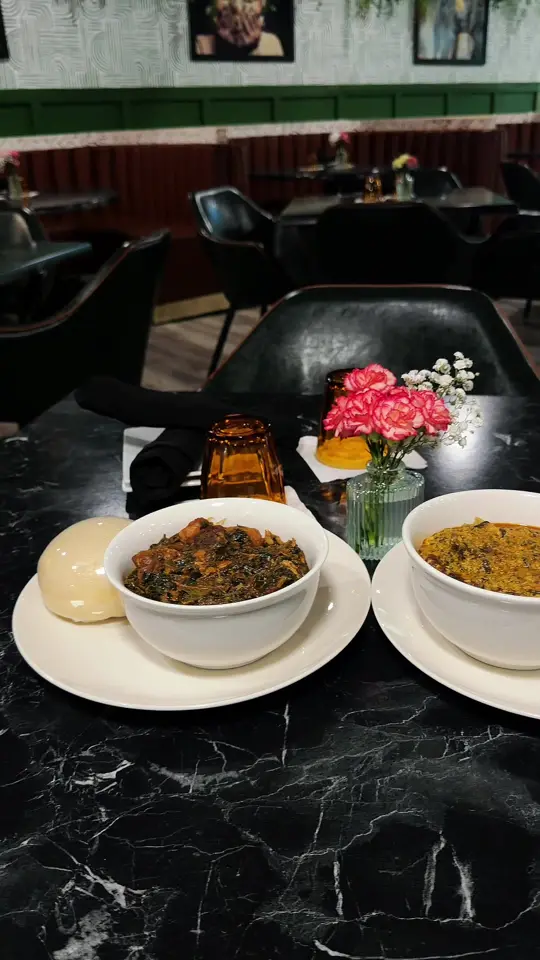 African Soulfood in Marietta showing restaurant visit, authentic african food, craft cocktails, video by africansoulfoodatl on TikTok