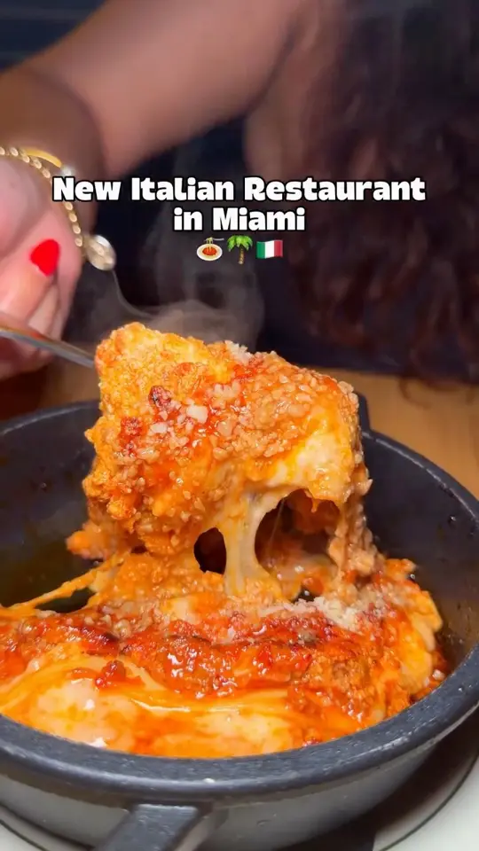 Allegro ma non Troppo in Miami showing italian food, lasagna, caesar salad, video by Gaby and Johnny on Facebook