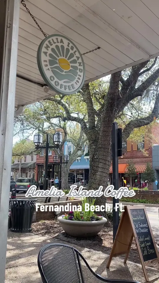 Amelia Island Coffee in Fernandina Beach showing review, visit, coffee, caramel cold brew, food, ham egg and cheese croissant, video by carliepeters on TikTok