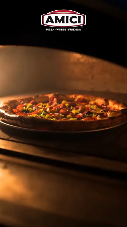 Amici Monroe in Monroe showing pizza, burger, video by Amici Monroe on Facebook