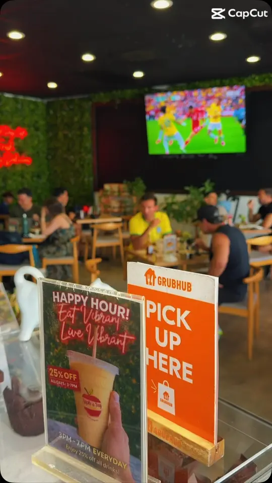 Apple A Day Cafe in Miami Beach showing healthy food, smoothies, cafe atmosphere, video by Apple a day miami beach on Facebook