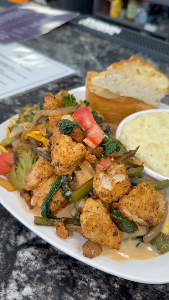 April's Place in Douglasville showing food, fried chicken veggie omelet, video by APRIL'S PLACE on Facebook