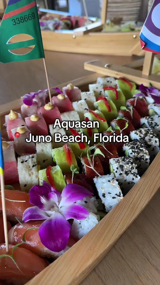 AquaSan in Juno Beach showing restaurant visit, interior design, hawaiian vibe, sushi, kfc chicken, salmon cone, truffle hamachi, steak tips, cc tea party, vicious virgin, video by alleyholland on TikTok