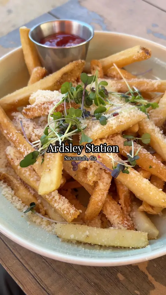 Ardsley Station in Savannah showing food, truffle fries with garlic aioli, station wedge salad, drive-in burger, seasonal vegetables, video by brandonmalik2000 on TikTok