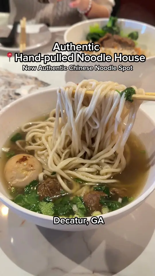 Authentic Hand-Pulled Noodle House in Decatur showing food review, biang biang noodles, braised short rib noodle soup, video by mis.shelly on TikTok