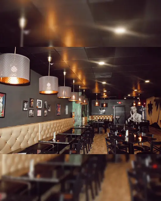 Babalu's Cuban Café in Port St. Lucie showing reopening announcement, interior decor, video by Babalu's Cuban Café on Facebook