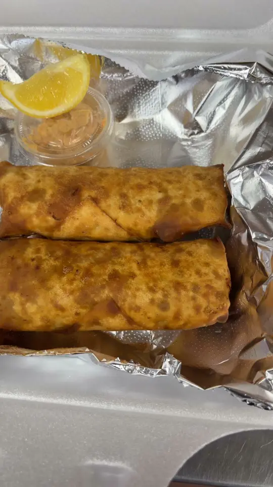Baltimore Crab Kings in Monroe showing food, crab & shrimp eggrolls, video by Baltimore Crab Kings Atl on Facebook
