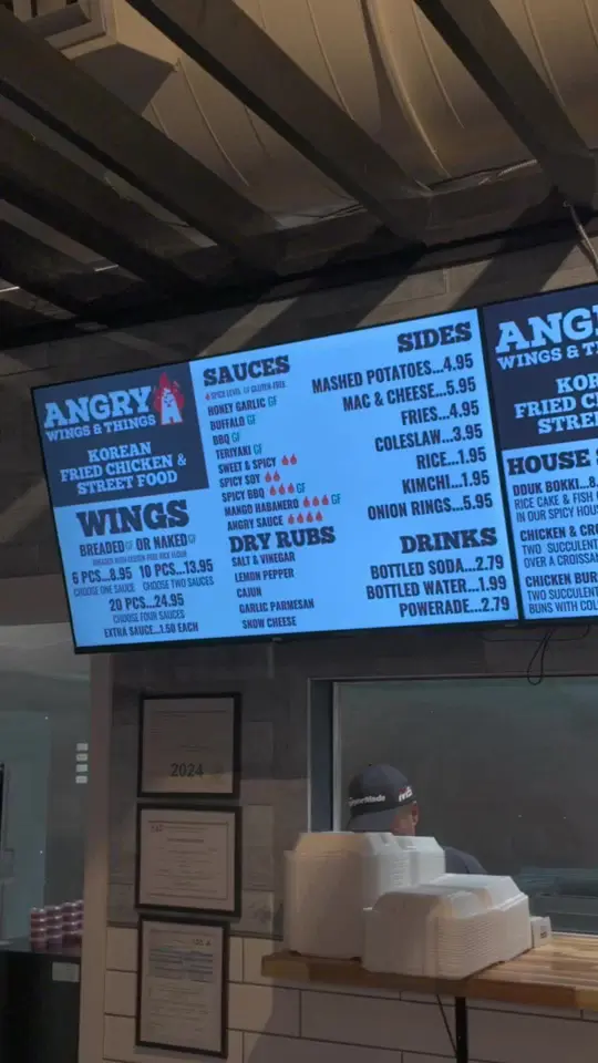 Banks Food Hall in Columbus showing restaurant visit, korean fried chicken, spicy soy sauce, angry mandu, fries, wings, video by mr.goalchaser on TikTok