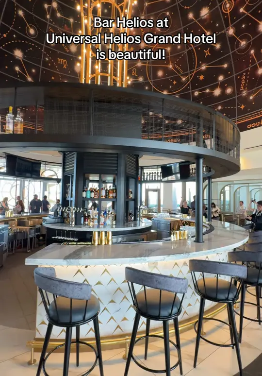Bar Helios in Orlando showing bar, atmosphere, video by themeparkshark on TikTok