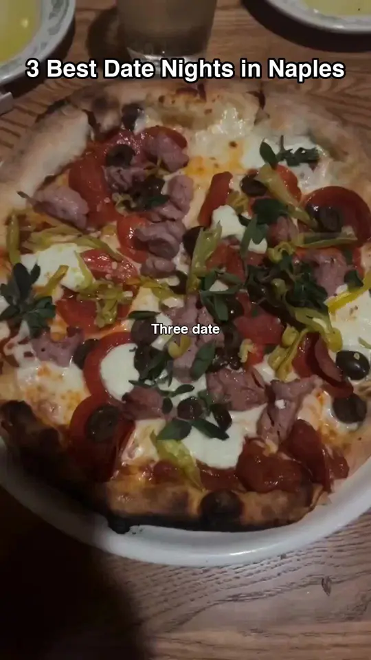 Bar Tulia Fifth Avenue Naples in Florida showing date night, italian food, local spots, video by tiktables.swfl on TikTok