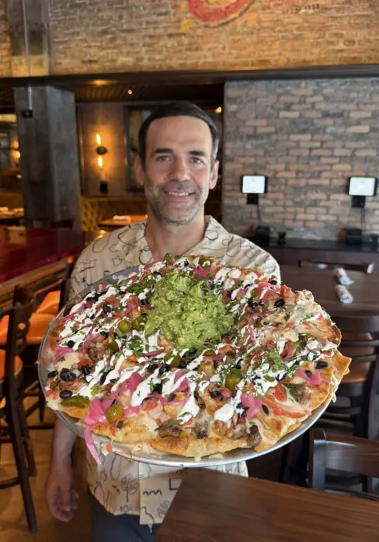 Bar Tulio's in Miami showing food, nachos, video by foodyfetish on TikTok