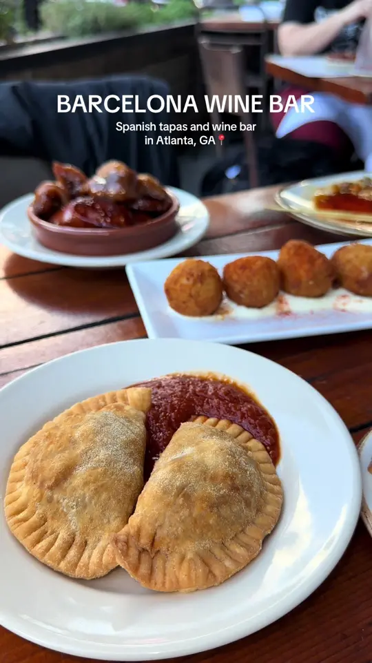 Barcelona Wine Bar in Atlanta showing small plates, tapas, sharing food, wine bar, restaurant visit, video by vivalarosieee on TikTok