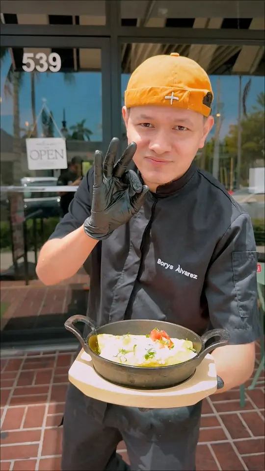 Barrio Taqueria in Naples showing food, chicken enchiladas, video by Barrio Naples on Facebook