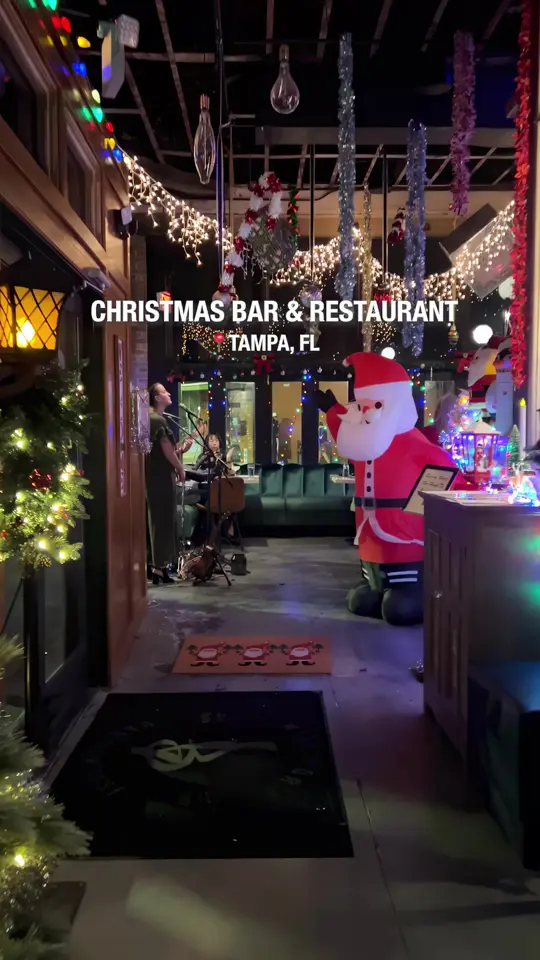 Barterhouse Ybor in Tampa showing cocktail, festive decor, video by tampabayraw on TikTok
