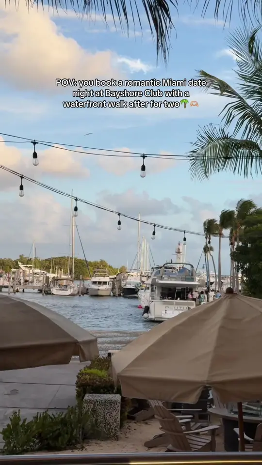 Bayshore Club Bar & Grill in Miami showing waterfront view, sunset, date night, video by chasingcarpediem on TikTok