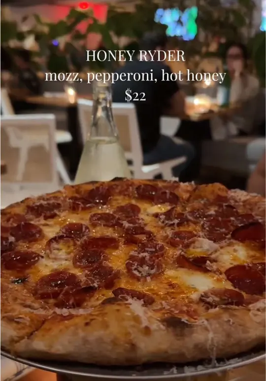Beach Club in Delray Beach showing review, pizza, hot honey pepperoni pizza, chicken bacon ranch pizza, cocktail, video by alisab.9 on TikTok