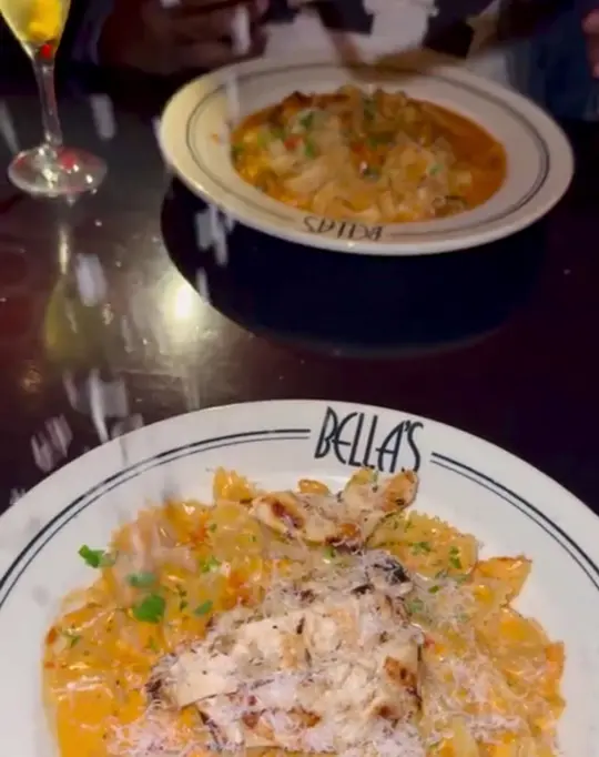 Bella's Italian Cafe in Tampa showing pizza, extra cheese, video by bellas.tampa on TikTok