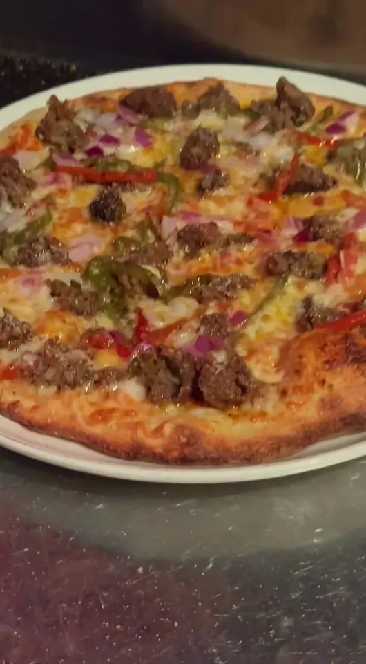 Bella's Italian Cafe in Tampa showing restaurant, italian food, pizza, video by bellas.tampa on TikTok