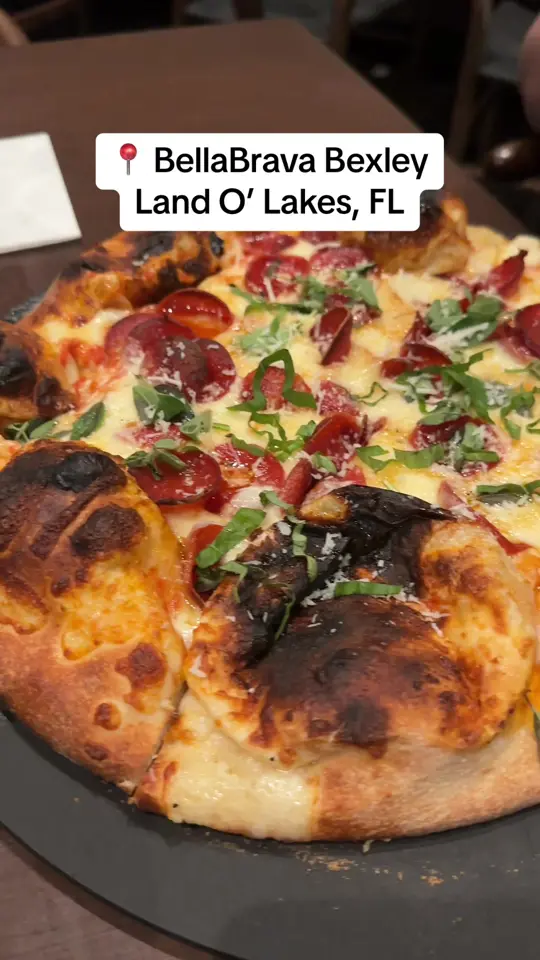  in Florida showing italian food, arancini balls, atmosphere, service, video by carloseats on TikTok