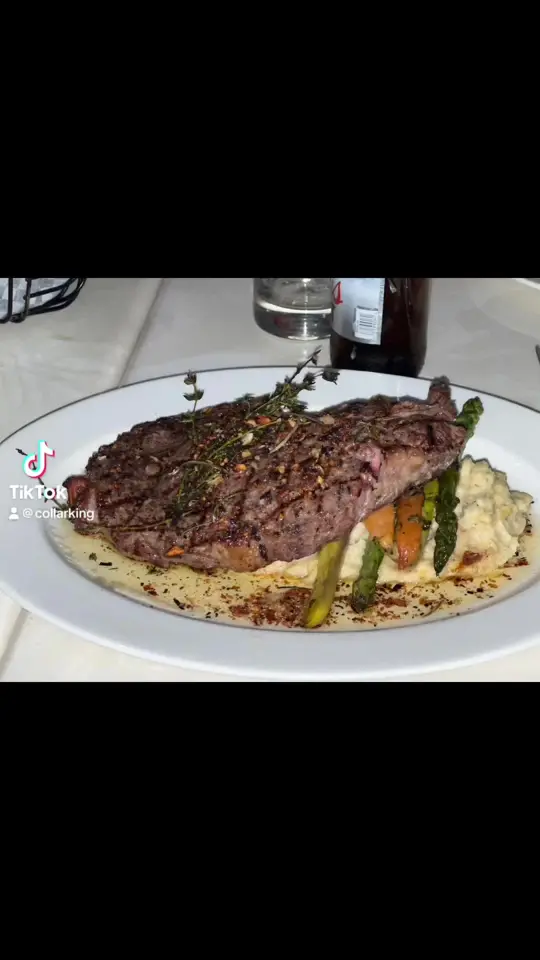 Bianca's Restaurant in Albany showing steak, medium rare ribeye, asparagus, mashed potatoes, video by collarking on TikTok