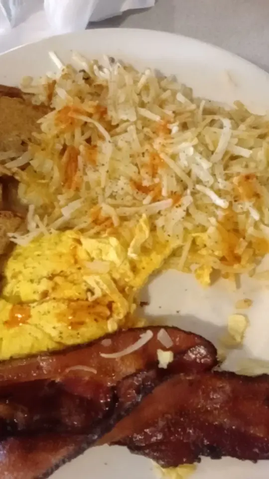 Big Mike's Diner in Hudson showing breakfast, hash browns, scrambled eggs, maple bacon, whole wheat toast, coffee, video by Let's Go To It with Sheree' on Facebook