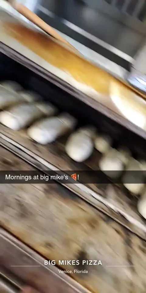 Big Mikes Pizza in Venice showing fresh bread, sicilians, busy atmosphere, video by Big Mikes Pizza on Facebook