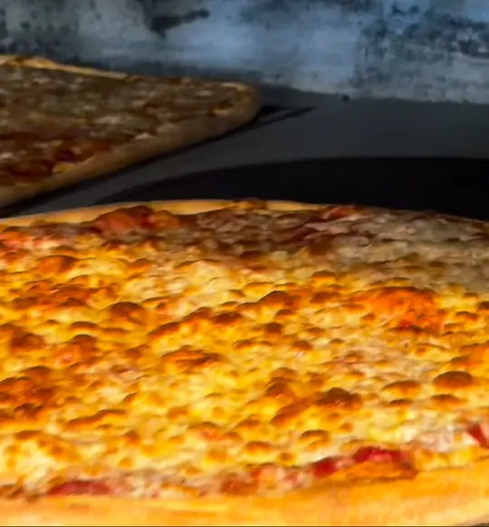 Big Nic's Pizzeria in Albany showing pizza, video by Big Nics Pizzeria & Sub on Facebook