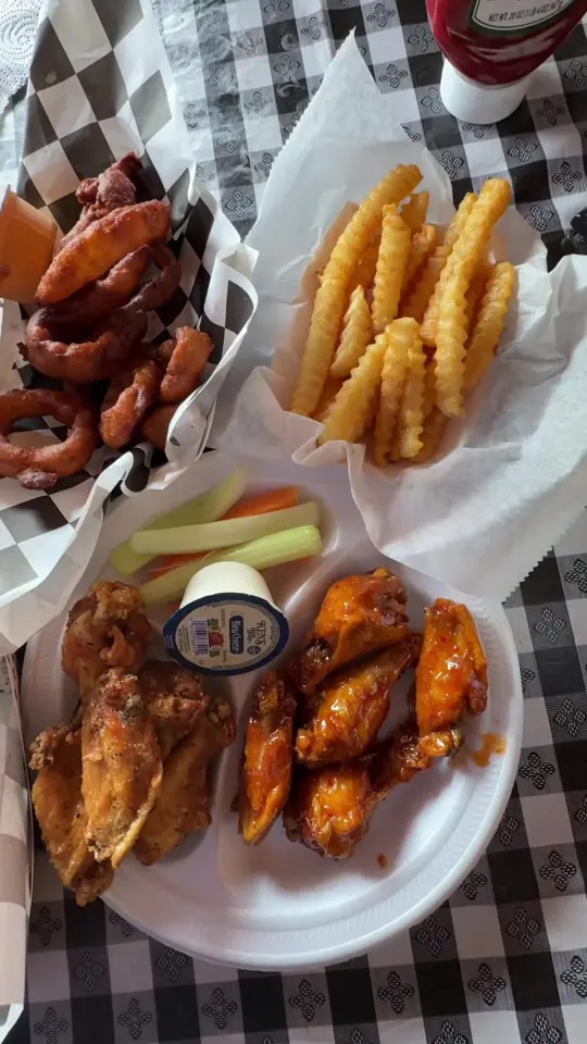 Blazers Hot Wings in Commerce showing food, chicken wings, onion rings, sandwiches, desserts, video by mountainsandmain on TikTok