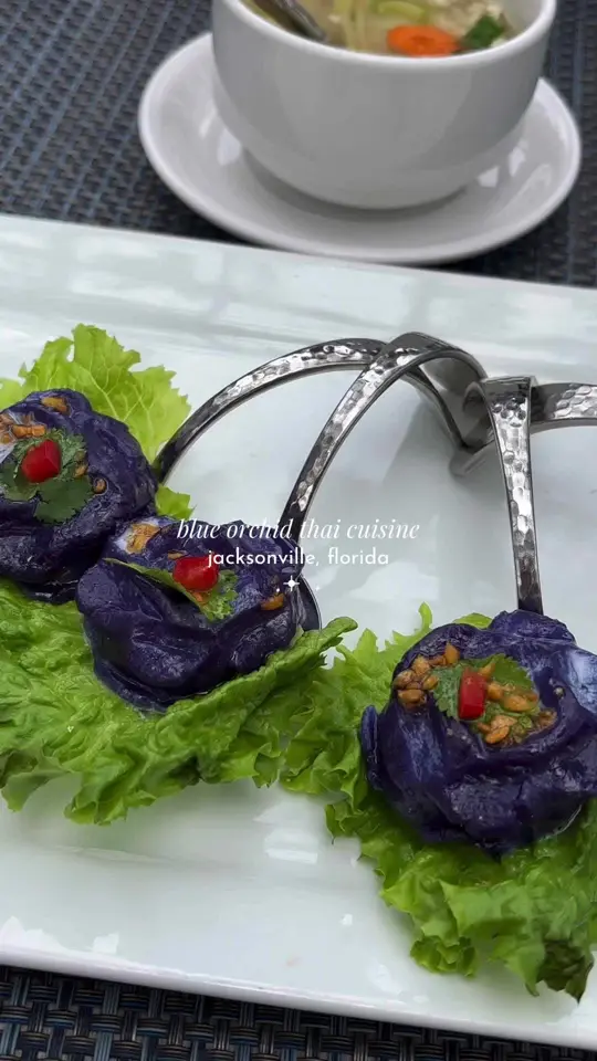 Blue Orchid Thai Cuisine in Jacksonville showing food, flower buds, panang curry with chicken, chicken + rice soup, video by ariblogging on TikTok