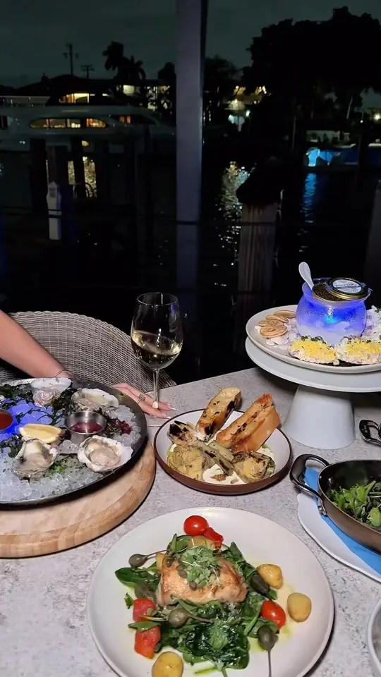  in Florida showing waterfront dining, caviar, oysters, seafood, steak, video by Boatyard on Facebook