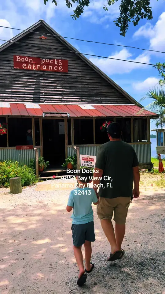 Boon Docks in Panama City Beach showing review, visit, shoestring onions, ranch, catfish and fries, ultimate burger, video by lovingpanamacitybeach on TikTok
