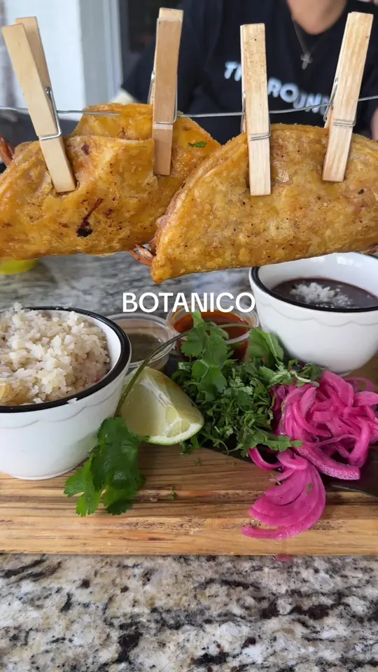 Botanico Kitchen & Bar in Newnan showing mexican food, birria tacos, live dj, fire dancer, atmosphere, palm trees, video by tr.dub on TikTok