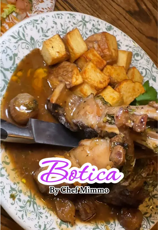 Botica in Atlanta showing paella, lamb chops, salmon, wine, video by servinglooksatl on TikTok