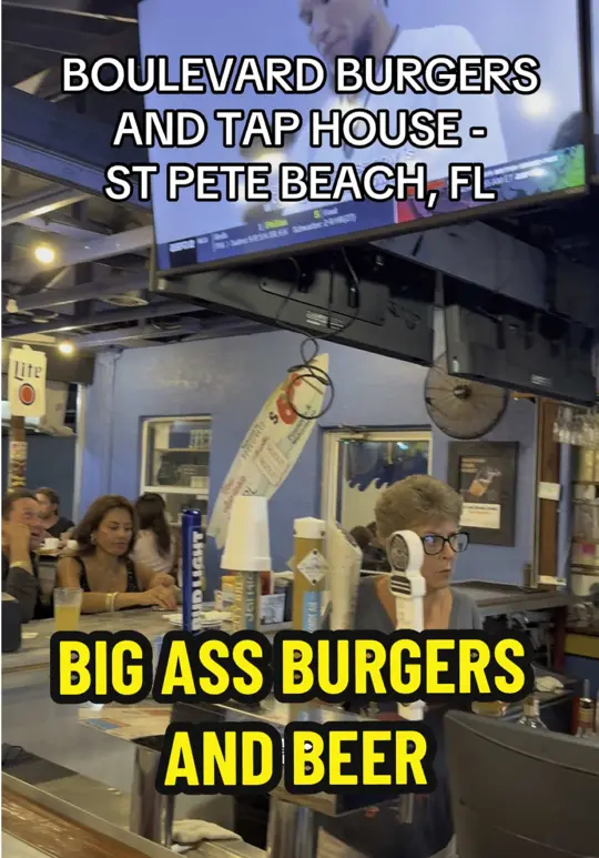 Boulevard Burgers & Tap House in St. Pete Beach showing drinks, mango lager; food, burgers; atmosphere, good vibes, video by moetrain on TikTok