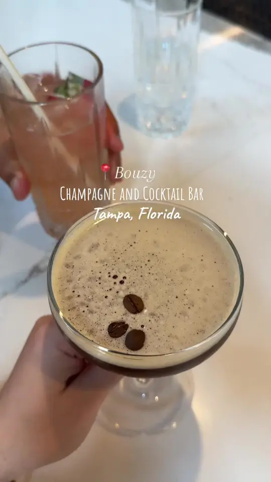 Bouzy in Tampa showing cocktail, popstar martini, video by tamintampa on TikTok