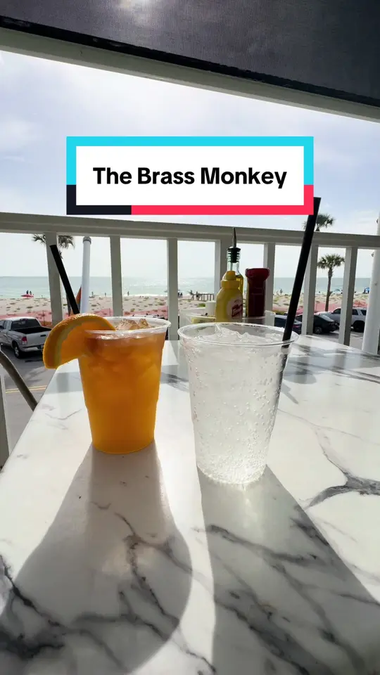 Brass Monkey in St. Pete Beach showing waterfront dining, beach views, tropical cocktails, food options, video by vonbergsintheburgg on TikTok