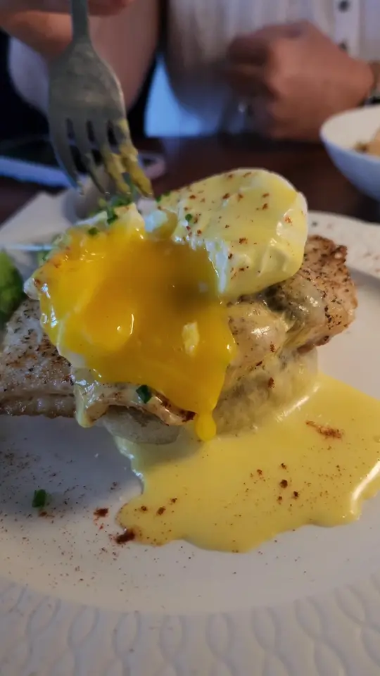 Brevardian Riverfront in Melbourne showing review, visit, shrimp and grits, grouper benedict, smoked bloody mary, video by villagefoodtours on TikTok
