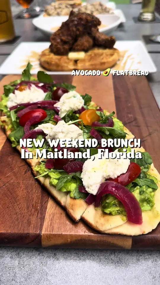 Brewlando in Orlando showing brunch, avocado flatbread, biscuits & sausage gravy, chicken and waffles, breakfast cuban sandwich, shrimp & grits, video by tastychomps on TikTok