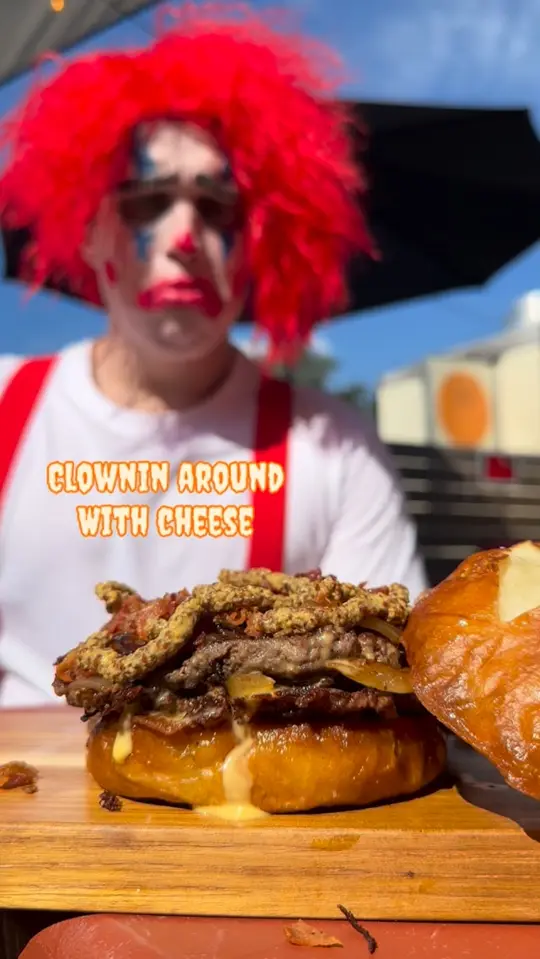 Brown Bagger Food Truck in Milton showing food, wagyu burger on pretzel bun, video by Brown Bagger Food Truck on Facebook