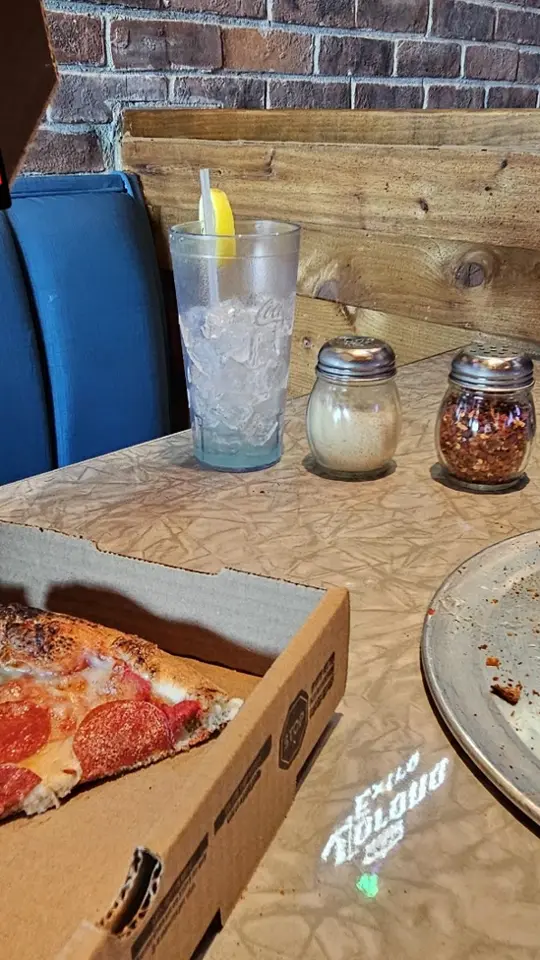 Bubba's 33 in Pensacola showing pizza, $12.99 12-inch pizza, video by Bubba's 33 on Facebook