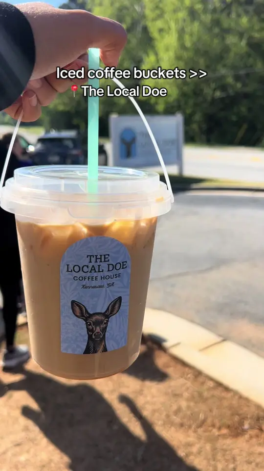 Bucket Shop Cafe in Atlanta showing review, visit, coffee, iced coffee buckets, video by nadiameghjani on TikTok