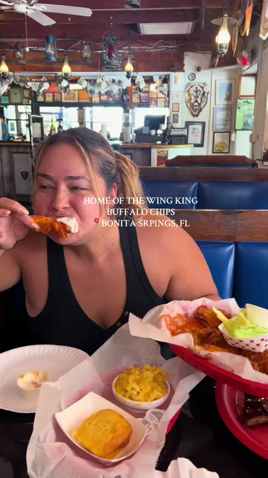 Buffalo Chips Restaurant in Bonita Springs showing restaurant visit, wings, homemade wing flavors, daily specials, bar atmosphere, sports memorabilia, video by sunnycoastblog on TikTok