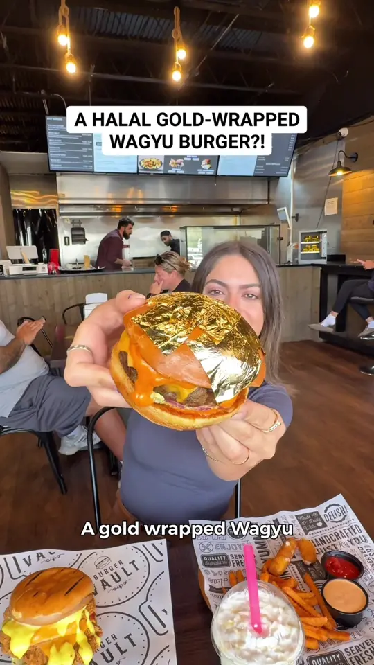 Burger Vault - Tampa in Temple Terrace showing food, halal gold-wrapped wagyu burger, video by foodbytiana on TikTok